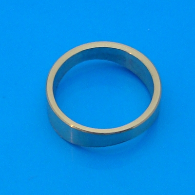 Brass bezel for illuminated switches